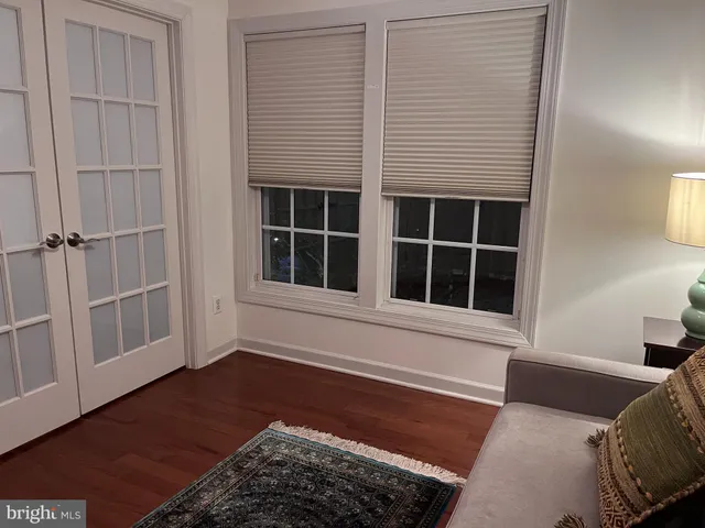 a view of a livingroom with furniture and window