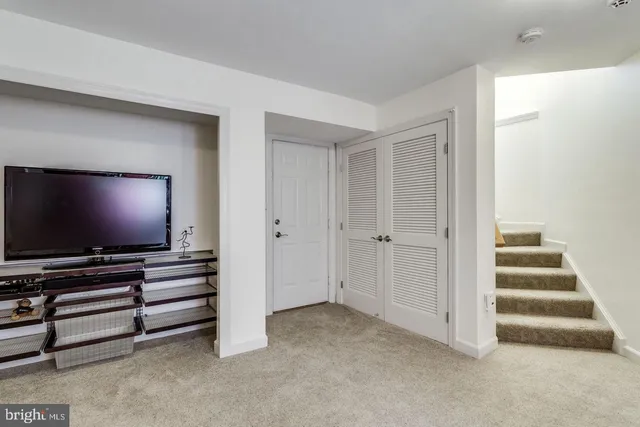 a view of livingroom with wooden floor and furniture