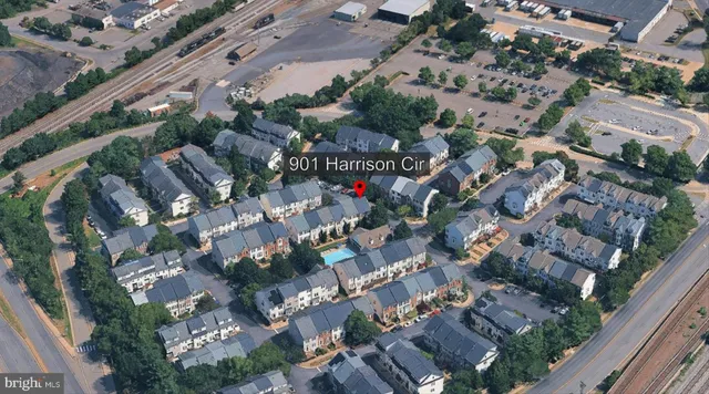 a picture of a bench in front of a wall