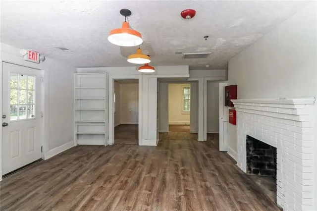 a view of a livingroom with a fireplace