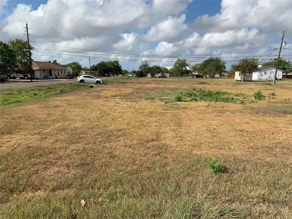 a view of a lake and a yard