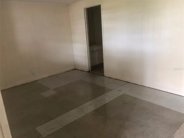 an empty room with closet