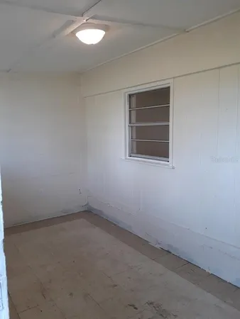 an empty room with a window