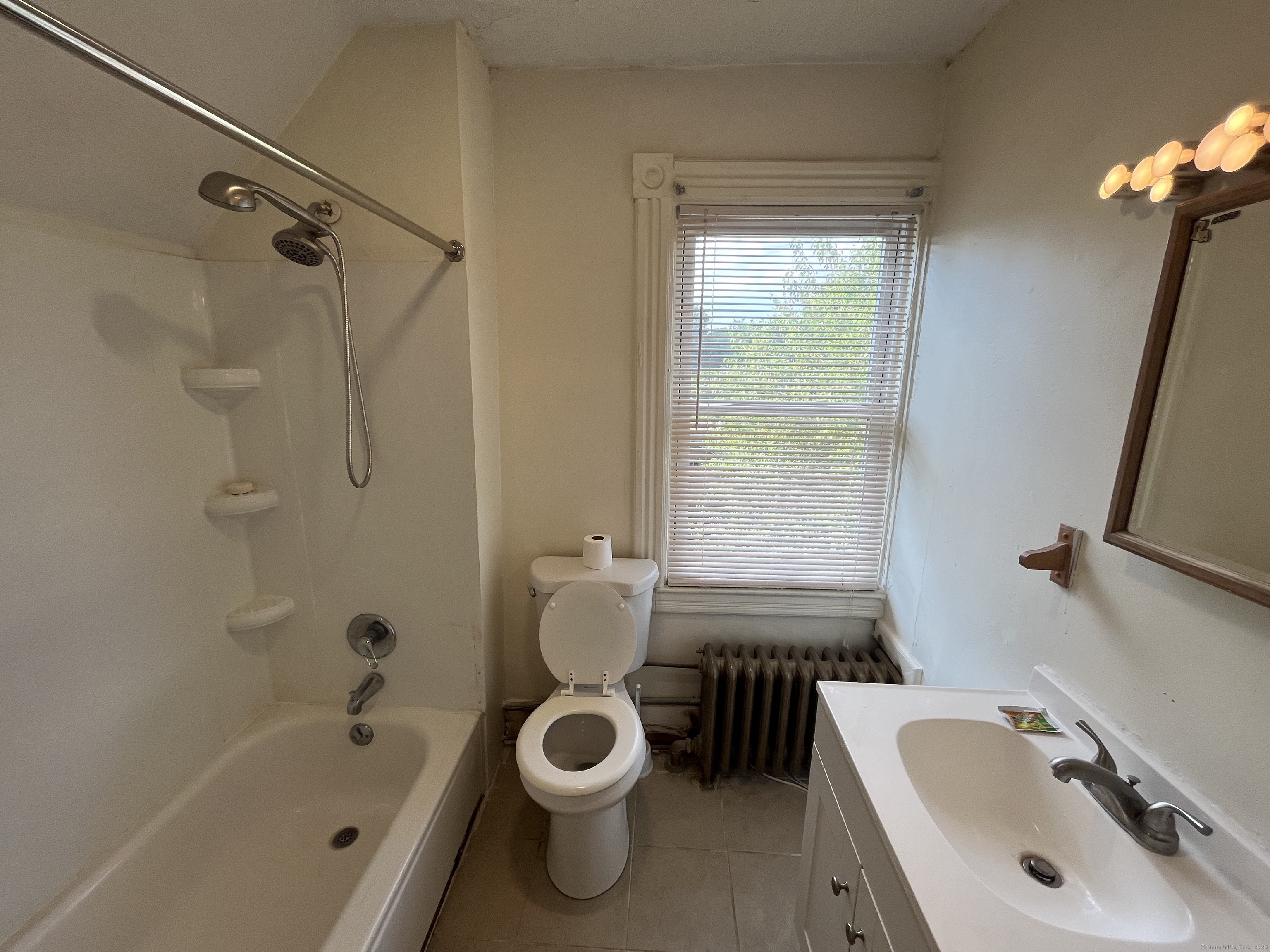 144 Burnham Street, Unit 2 Hartford, CT 06112 - Photo 10 of 11 a bathroom with a sink toilet and shower