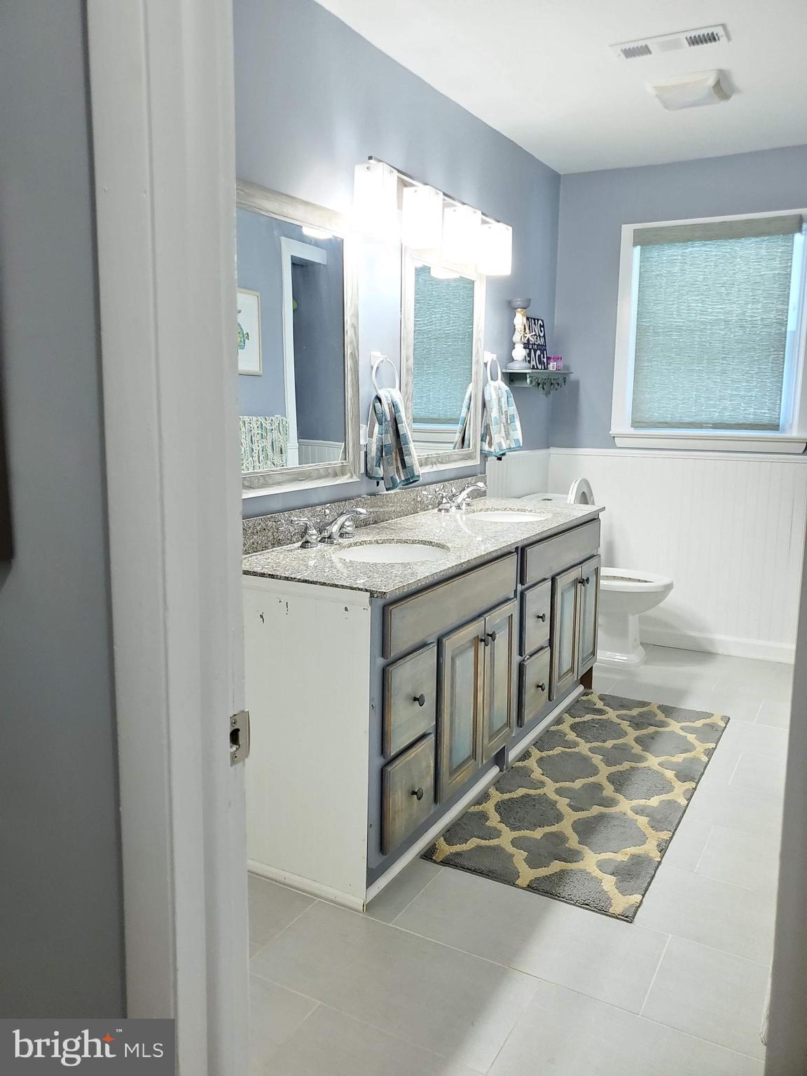 10253 Harrison Road Berlin, MD 21811 - Photo 14 of 22 Double sinks on granite, master entry and hall