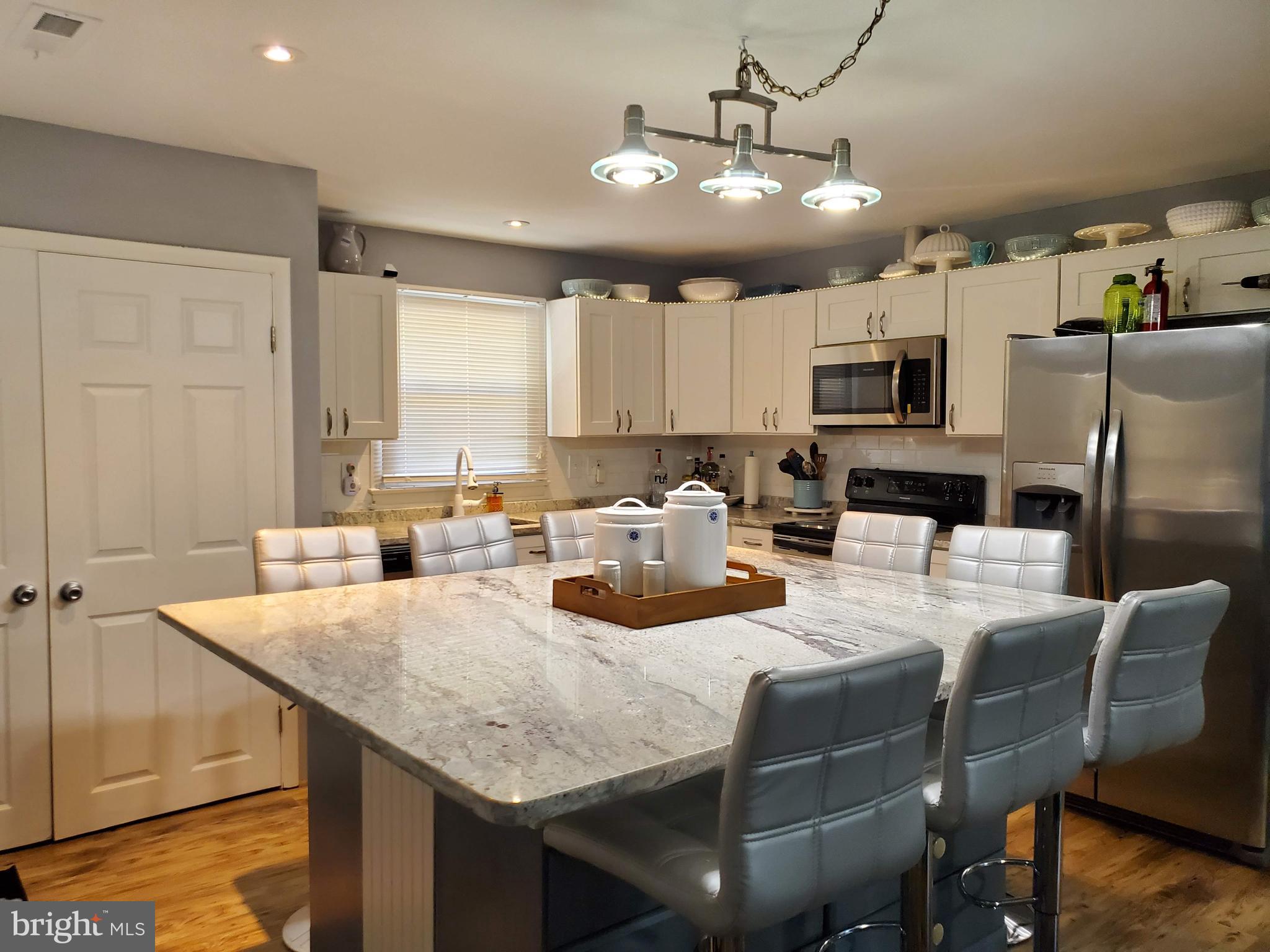 10253 Harrison Road Berlin, MD 21811 - Photo 5 of 22 Very large kitchen table with extra storage