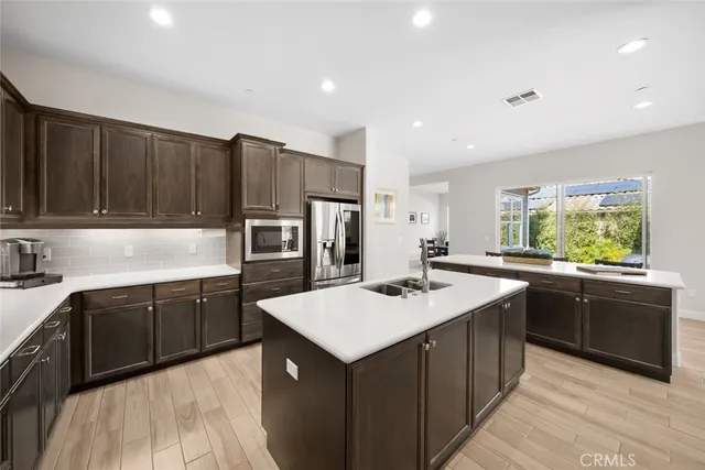 a outdoor living space with furniture and a potted plant