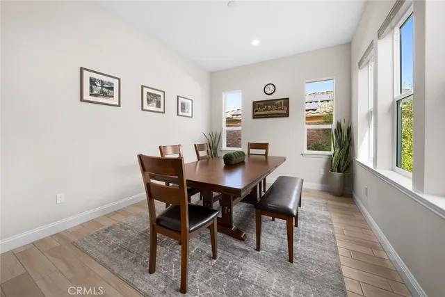 a bedroom with a bed and a chair