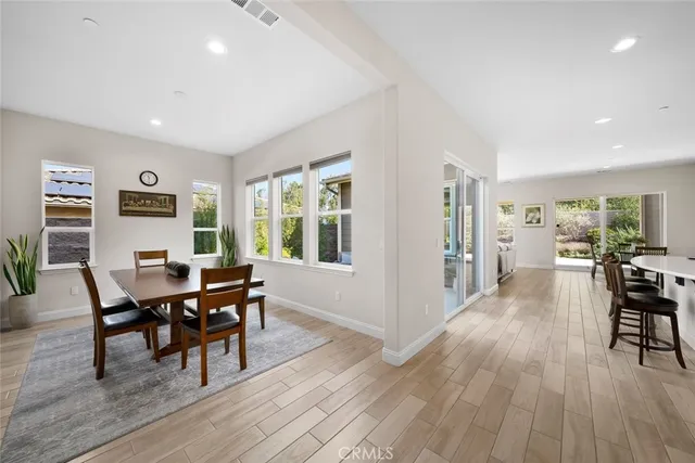 a large bathroom with a large tub and sink