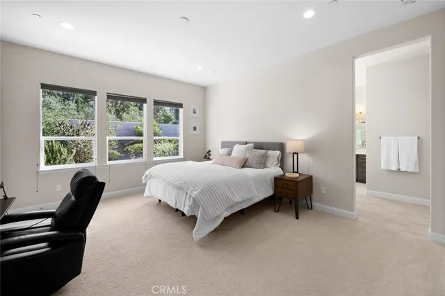 a bathroom with a sink double vanity and a shower