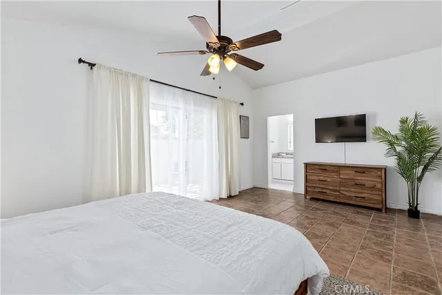 a bathroom with double vanity sinks and two mirror