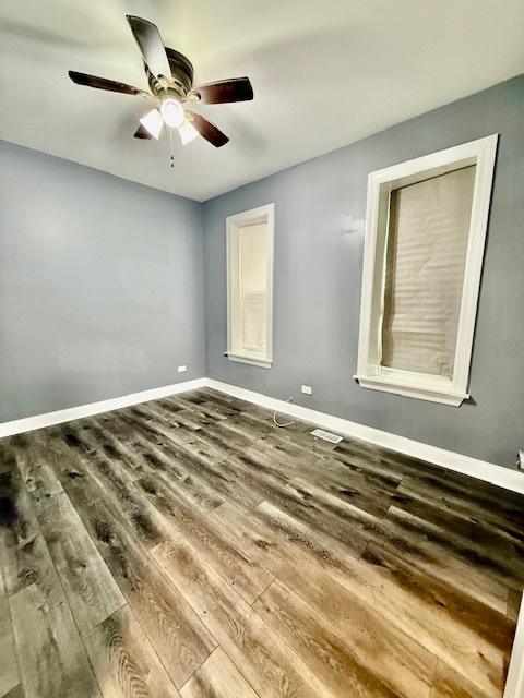 7823 South Morgan Street, Unit 1 Chicago, IL 60620 - Photo 6 of 13 a view of a room with a ceiling fan