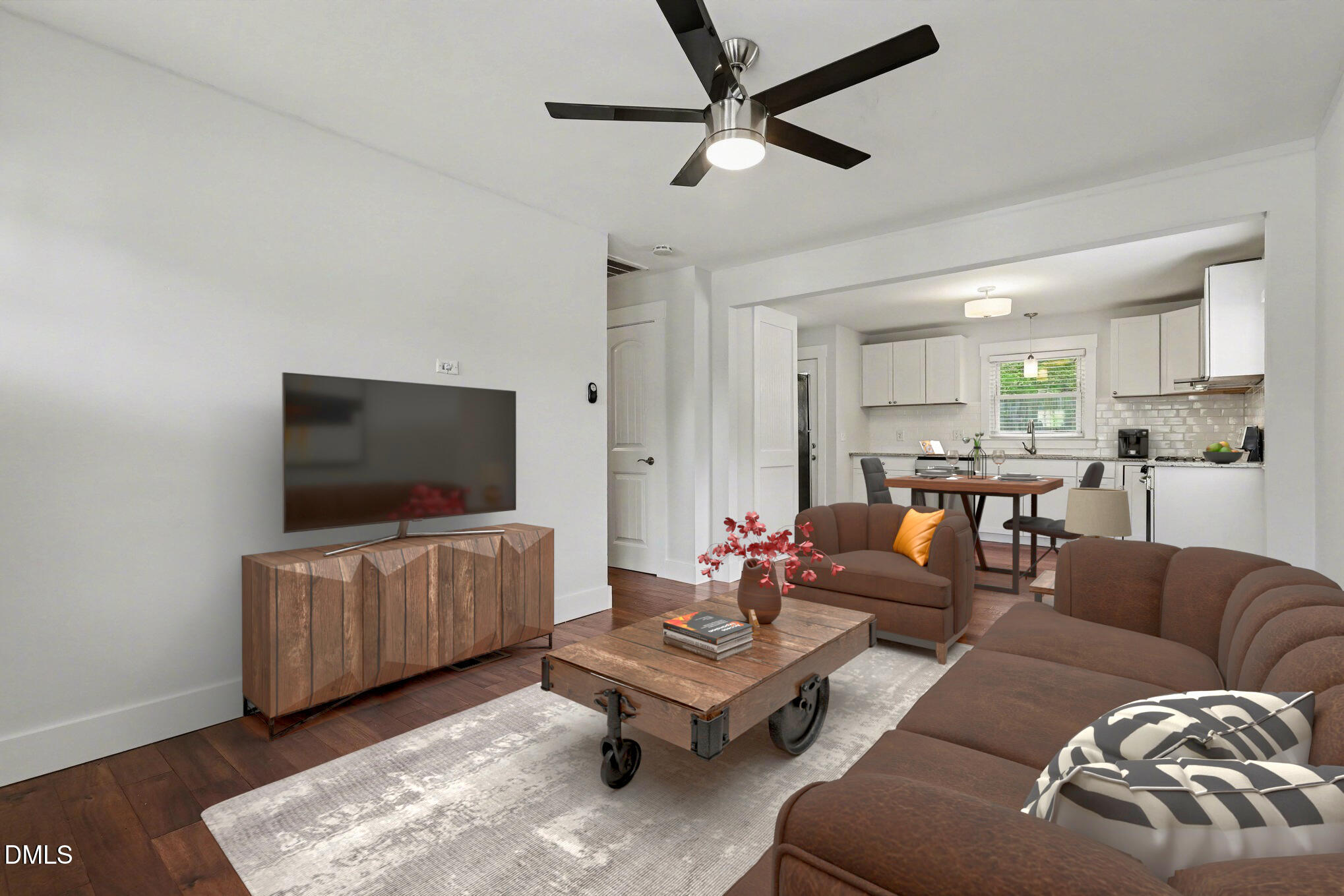 727 South State Street Raleigh, NC 27601 - Photo 5 of 30 a living room with furniture and a flat screen tv