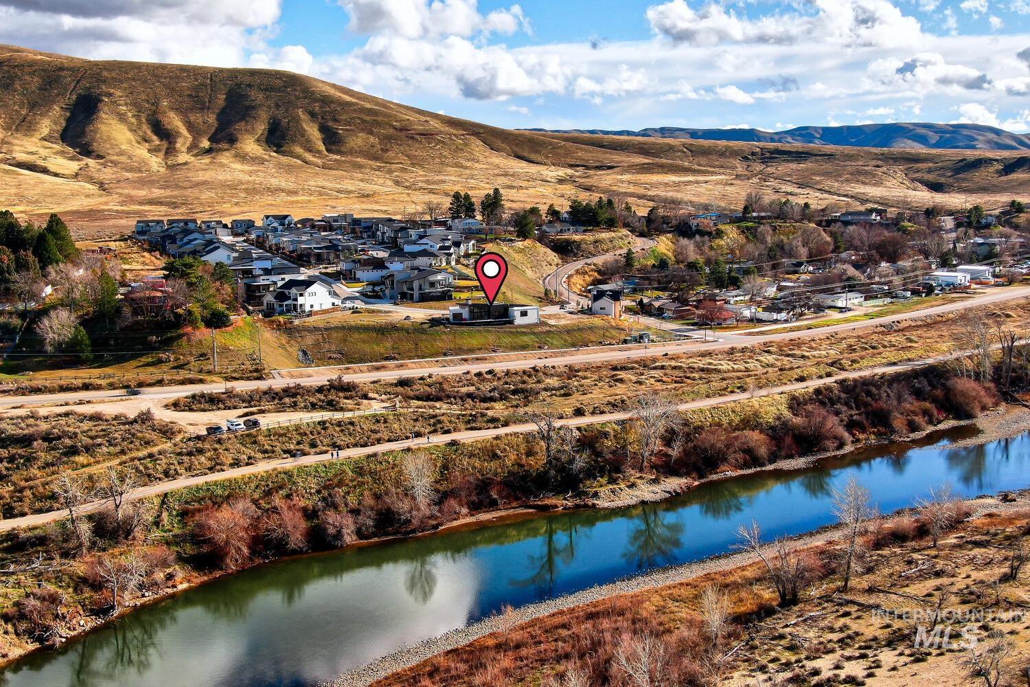 5775 South Brian Way Boise, ID 83716 - Photo 12 of 13 Drone / aerial view of a water and mountain view
