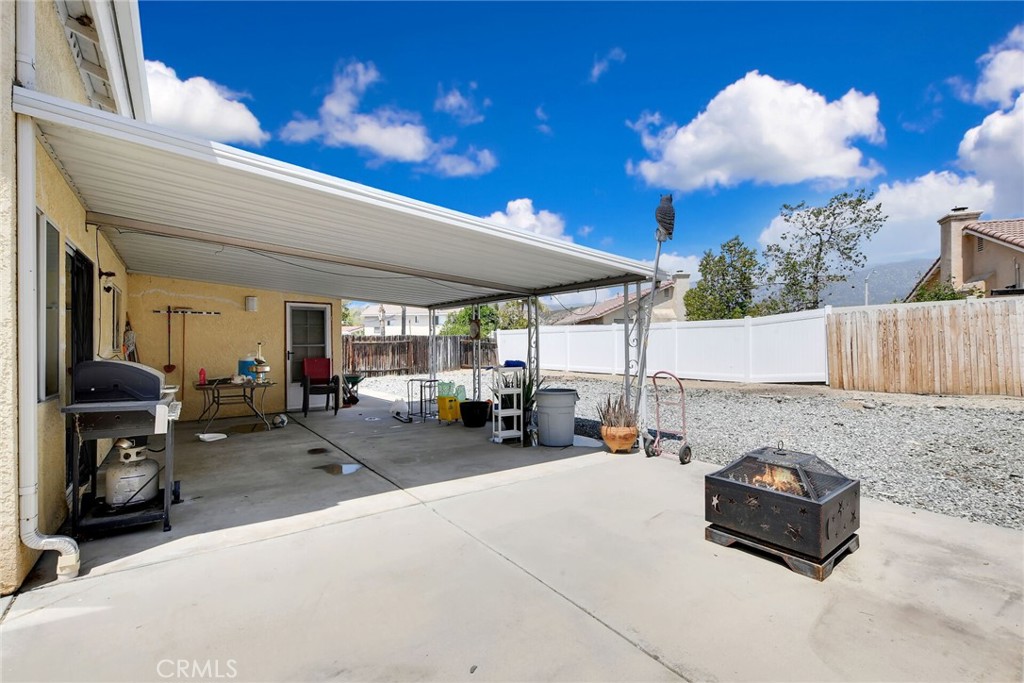 24880 Balestrieri Road Hemet, CA 92544 - Photo 23 of 34 a car parked in front of a house
