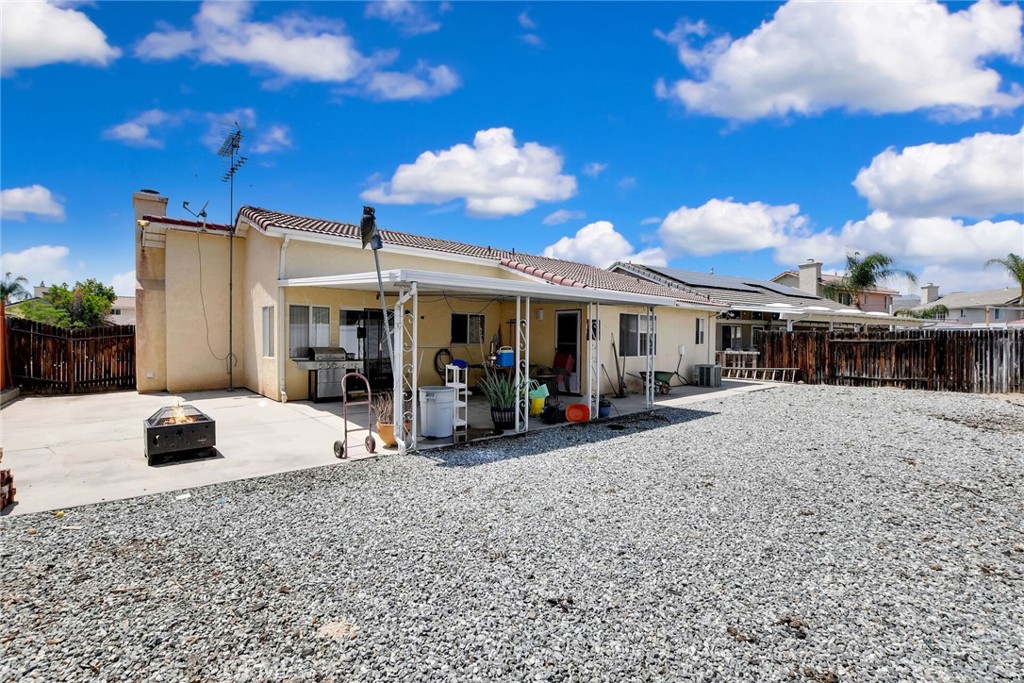 24880 Balestrieri Road Hemet, CA 92544 - Photo 24 of 34 a view of a house with basketball court