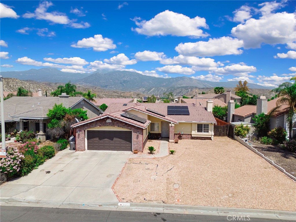 24880 Balestrieri Road Hemet, CA 92544 - Photo 26 of 34 a view of a house with a yard