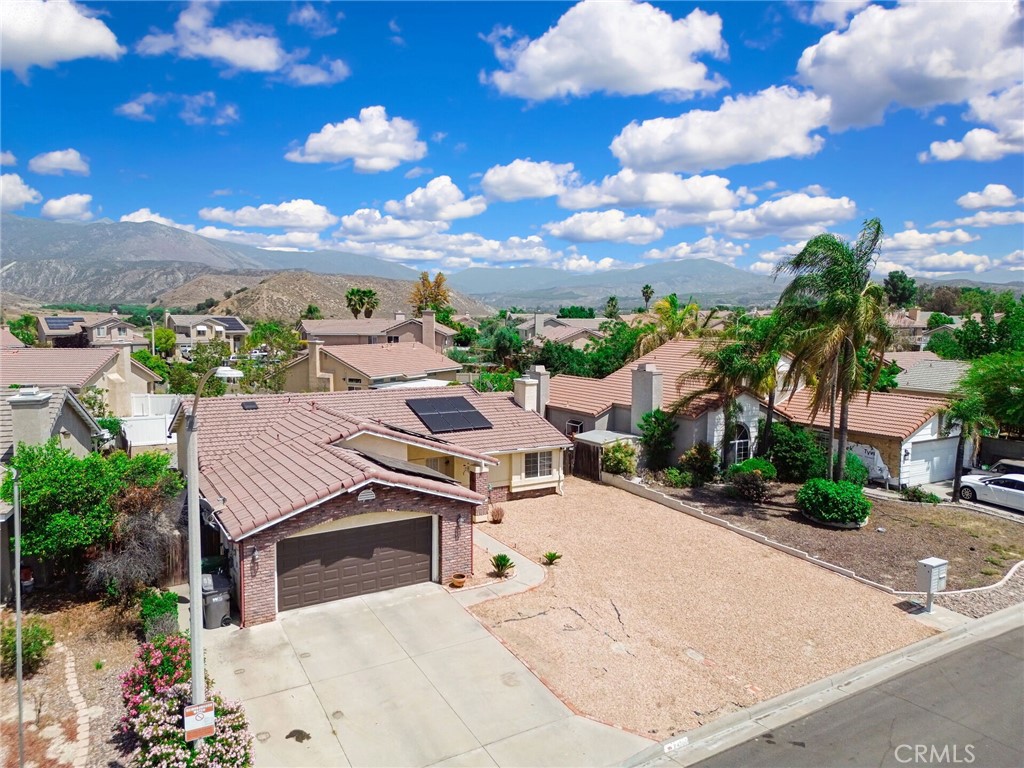 24880 Balestrieri Road Hemet, CA 92544 - Photo 27 of 34 a view of a house with a yard
