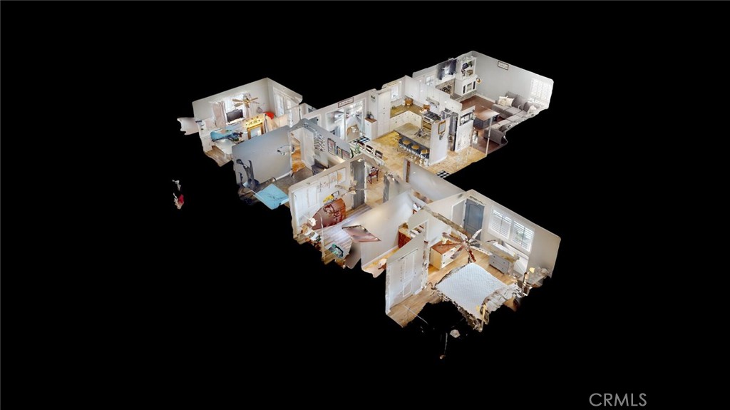 24880 Balestrieri Road Hemet, CA 92544 - Photo 34 of 34 a bed with white sheets and a blanket on it