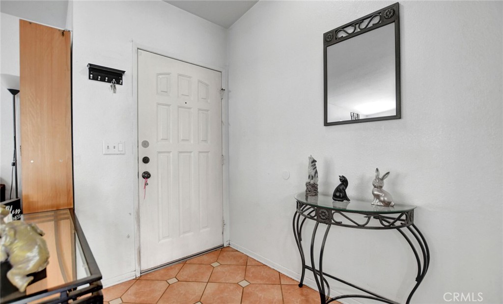 24880 Balestrieri Road Hemet, CA 92544 - Photo 4 of 34 a view of a room with gym equipment