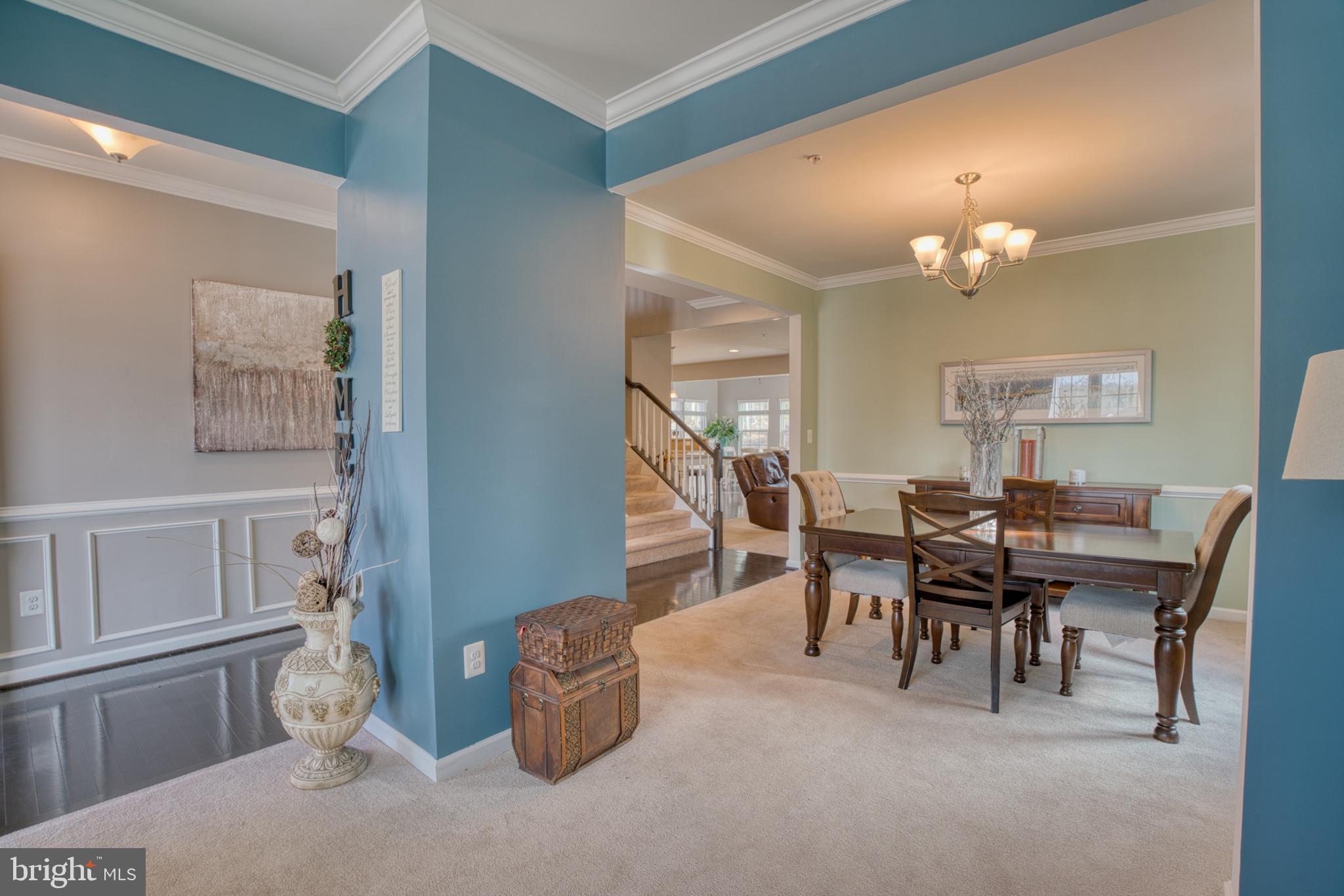 505 Potomac Road Joppa, MD 21085 - Photo 17 of 66 a view of a dining room with furniture and chandelier