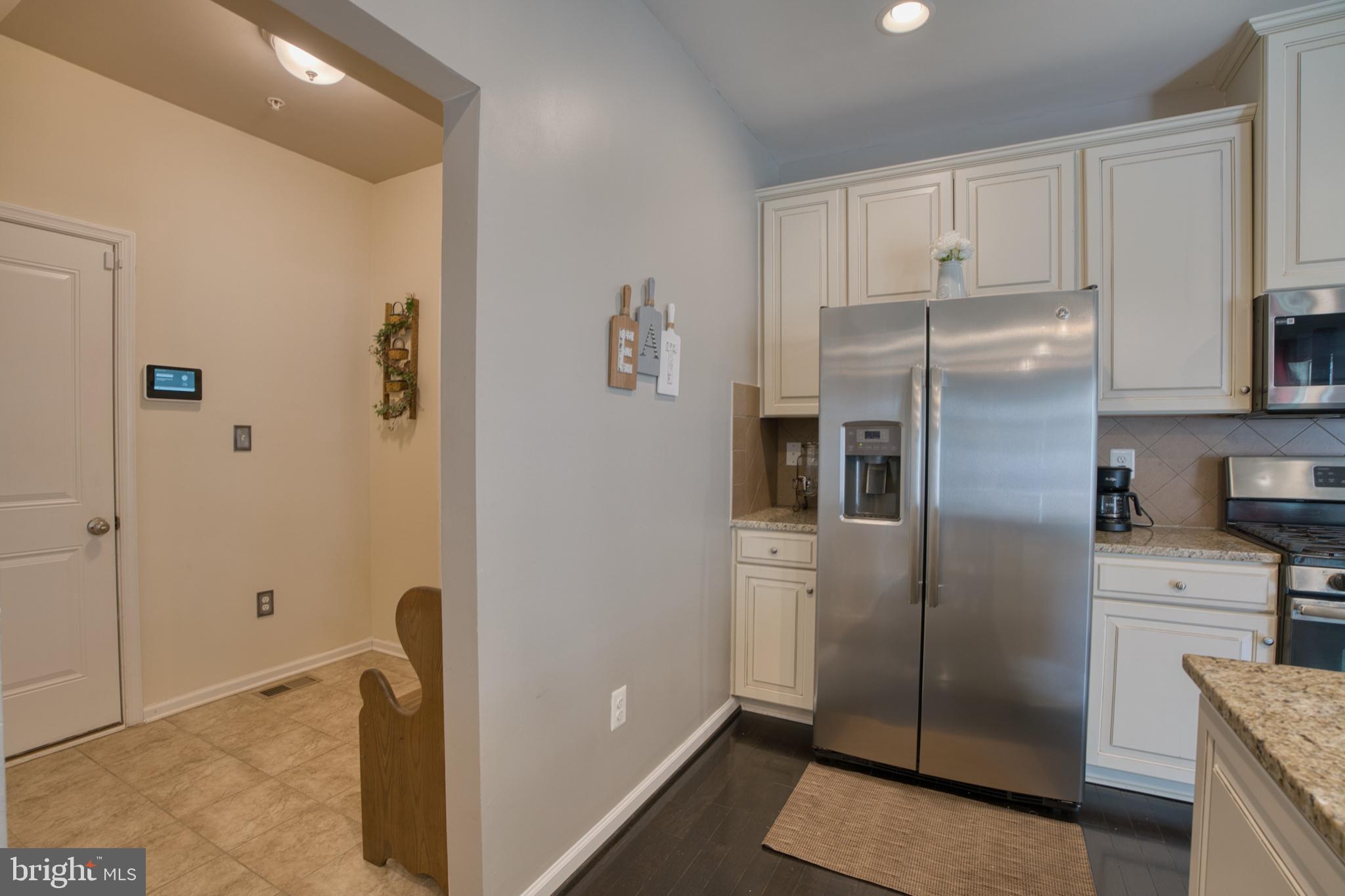 505 Potomac Road Joppa, MD 21085 - Photo 22 of 66 a kitchen with stainless steel appliances granite countertop a refrigerator and a sink