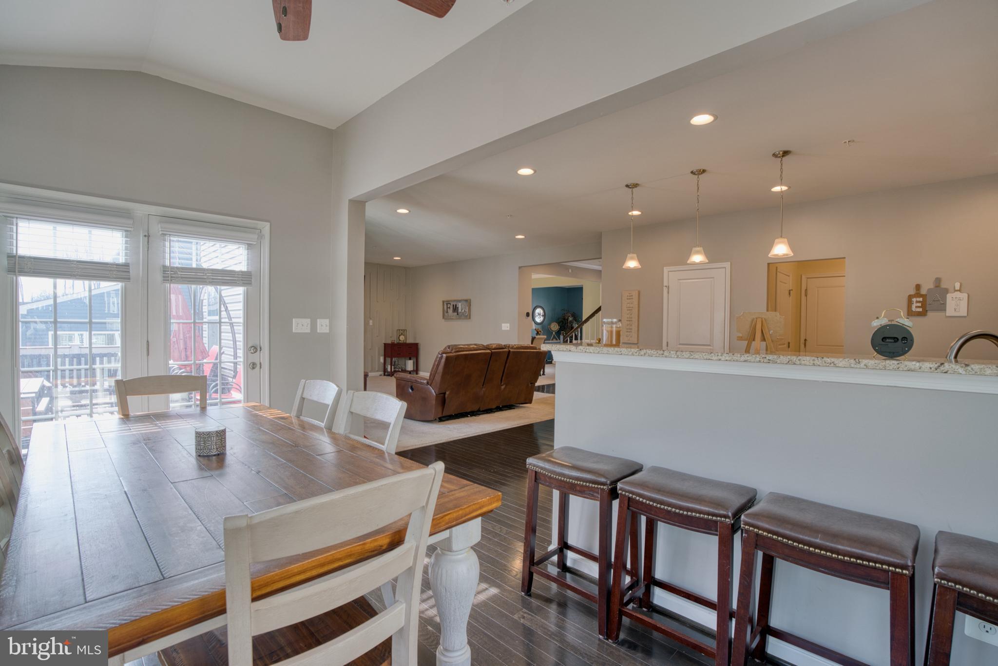 505 Potomac Road Joppa, MD 21085 - Photo 25 of 66 a view of kitchen with dining table and chairs