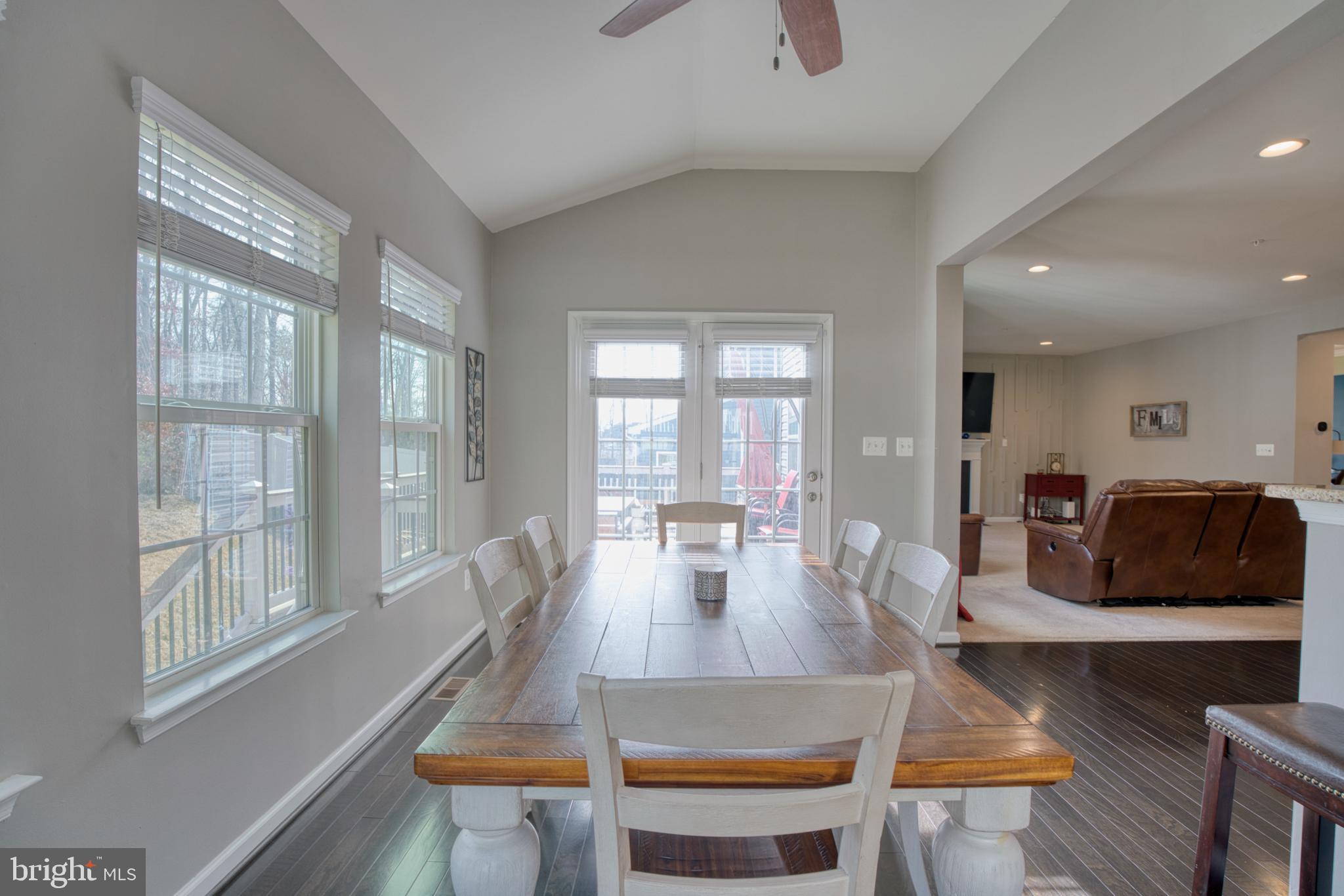 505 Potomac Road Joppa, MD 21085 - Photo 27 of 66 a living room with furniture wooden floor and a large window