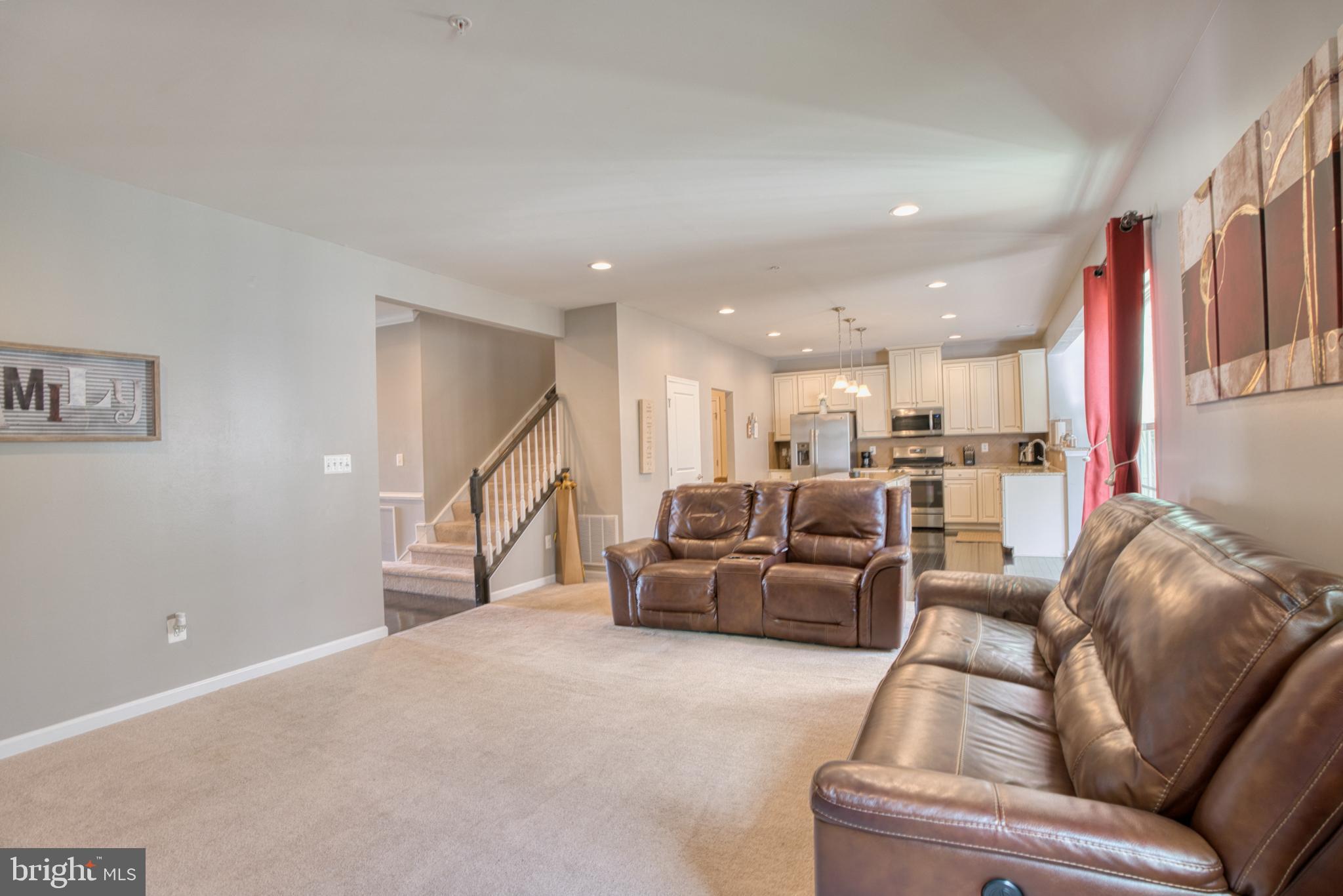 505 Potomac Road Joppa, MD 21085 - Photo 30 of 66 a living room with furniture and a wooden floor
