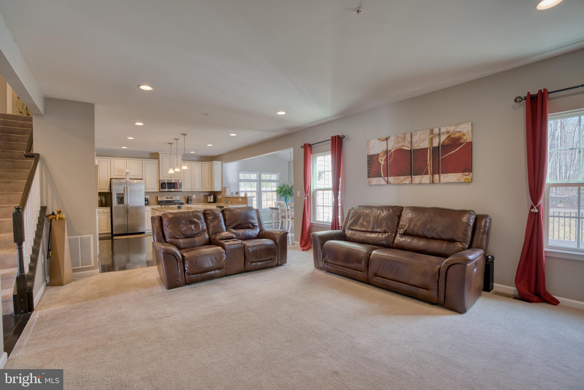 505 Potomac Road Joppa, MD 21085 - Photo 31 of 66 a living room with furniture and a flat screen tv