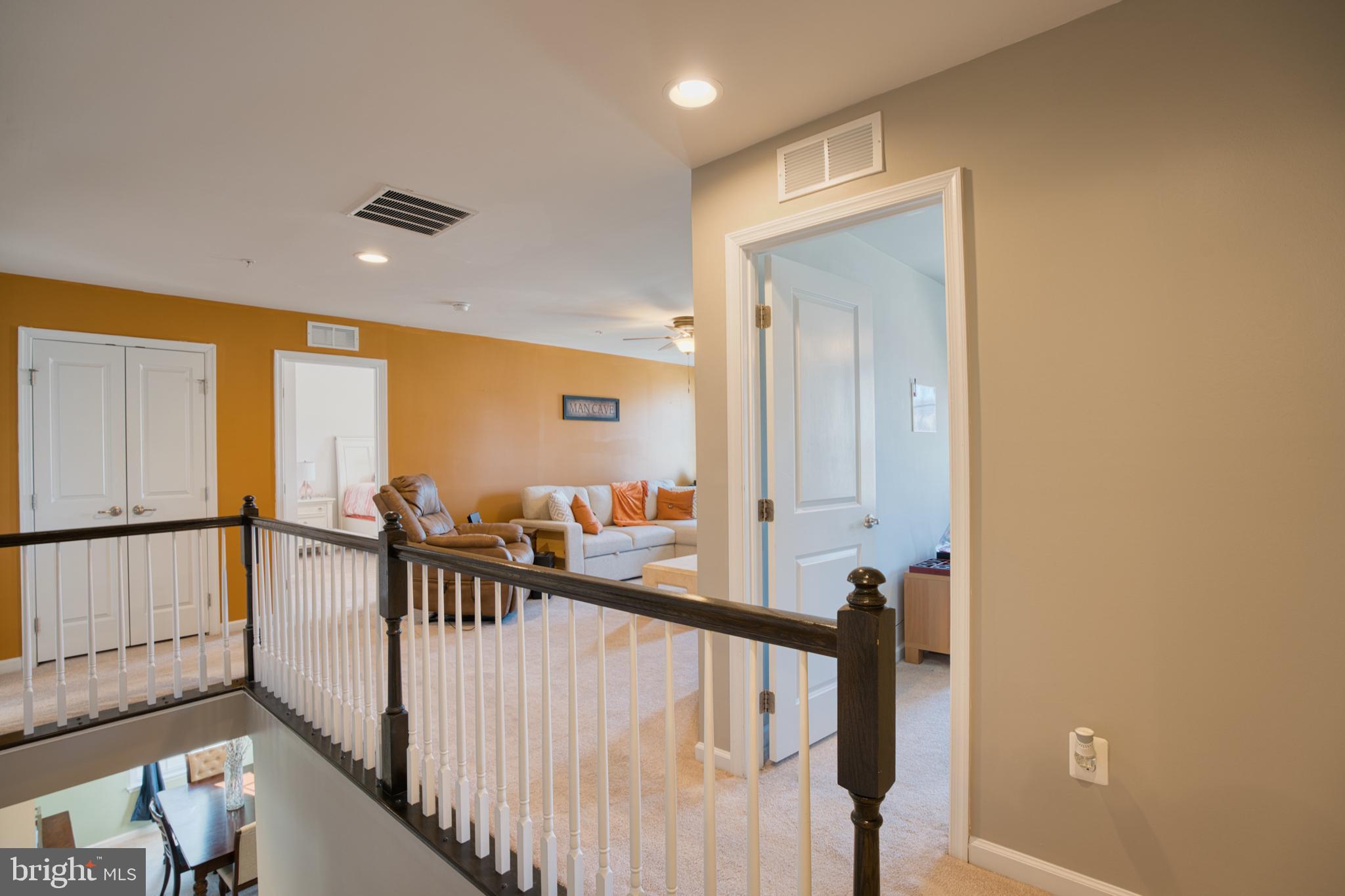 505 Potomac Road Joppa, MD 21085 - Photo 44 of 66 a view of staircase with lots of wooden floor and windows