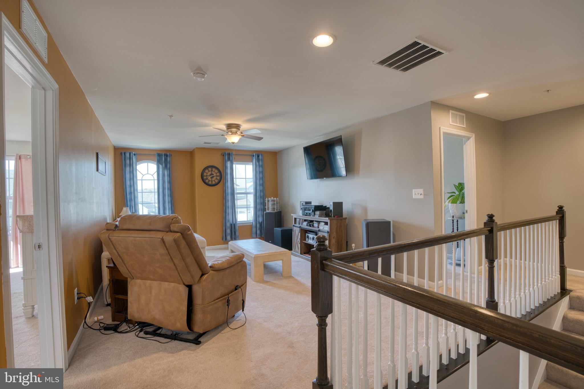 505 Potomac Road Joppa, MD 21085 - Photo 45 of 66 a living room with furniture and a flat screen tv
