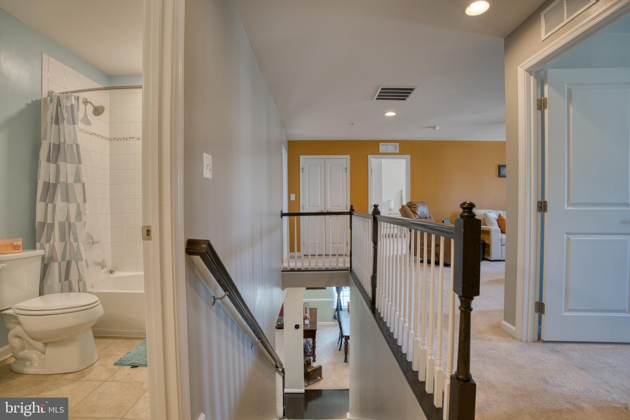 505 Potomac Road Joppa, MD 21085 - Photo 46 of 66 a bathroom with a toilet a sink and a mirror