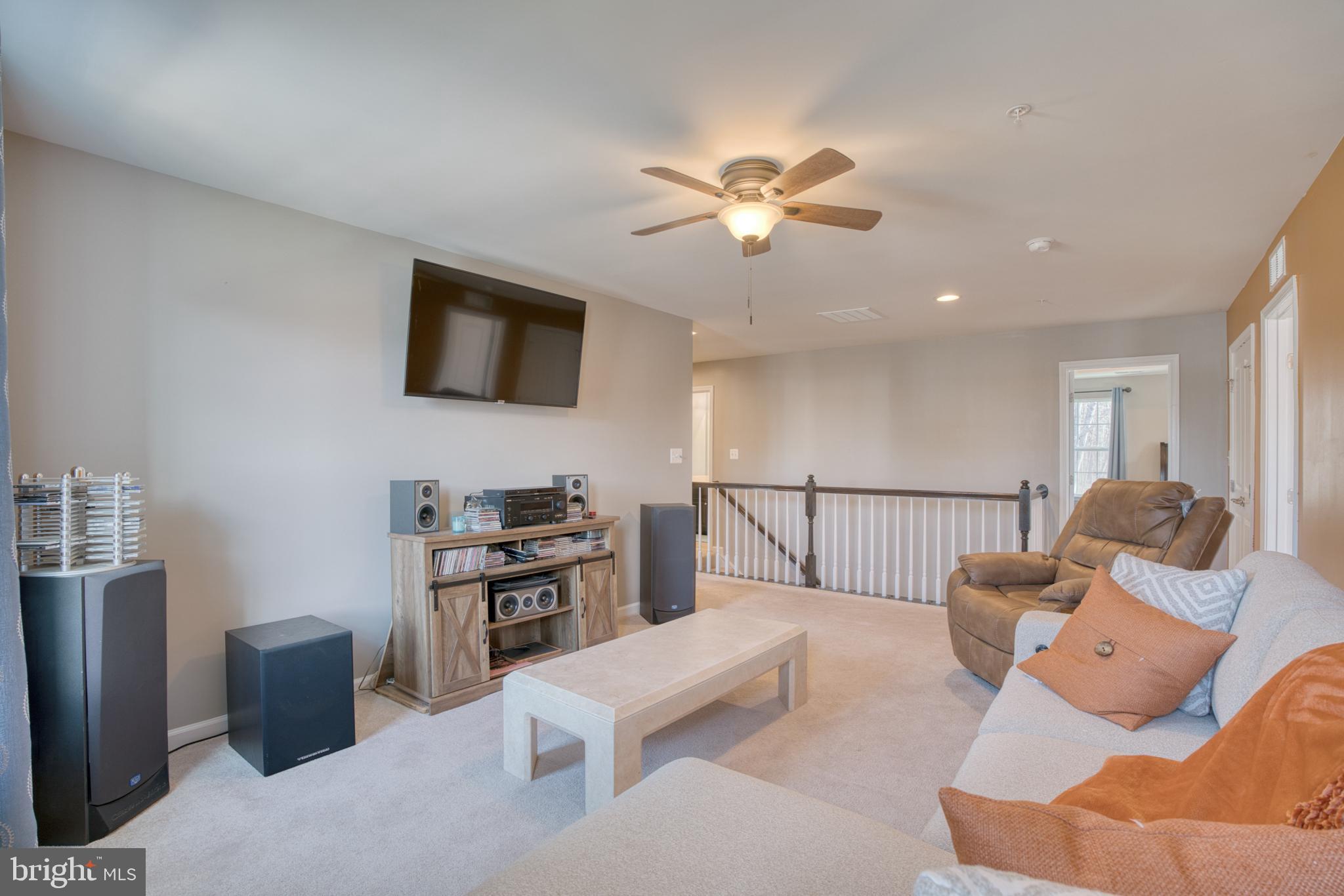 505 Potomac Road Joppa, MD 21085 - Photo 47 of 66 a living room with furniture and a flat screen tv