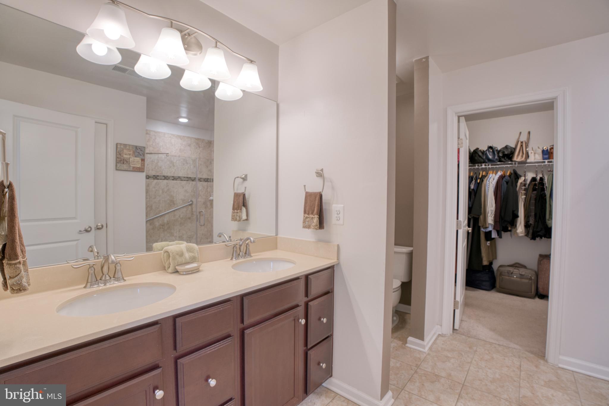 505 Potomac Road Joppa, MD 21085 - Photo 52 of 66 a bathroom with a sink vanity and a mirror