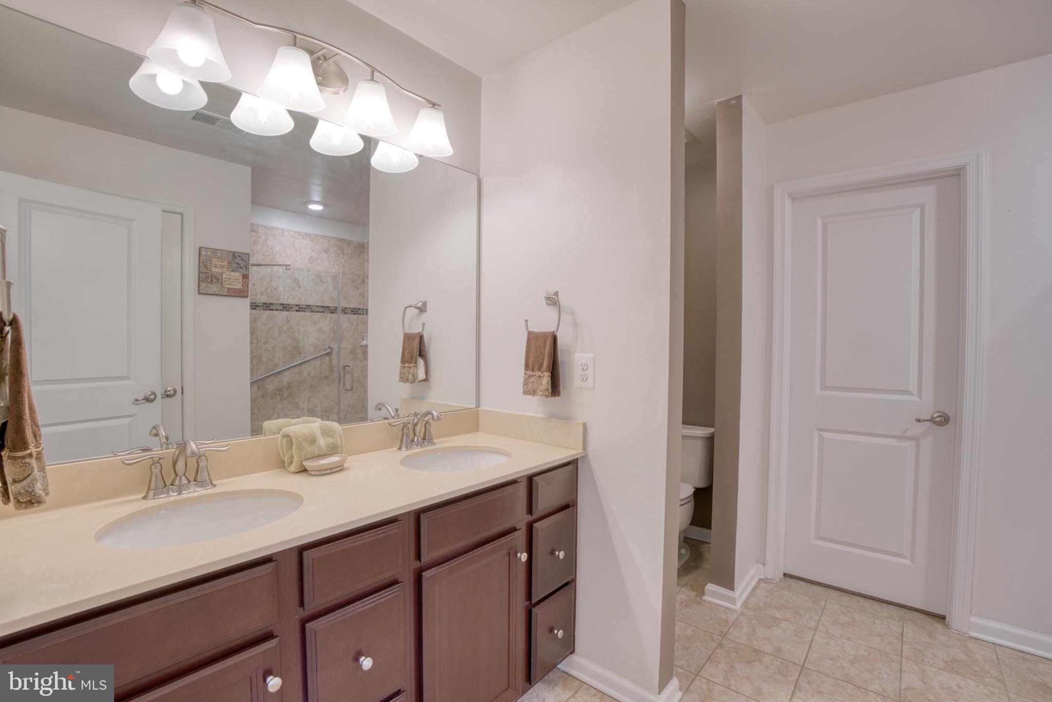 505 Potomac Road Joppa, MD 21085 - Photo 53 of 66 a bathroom with a sink vanity and a mirror