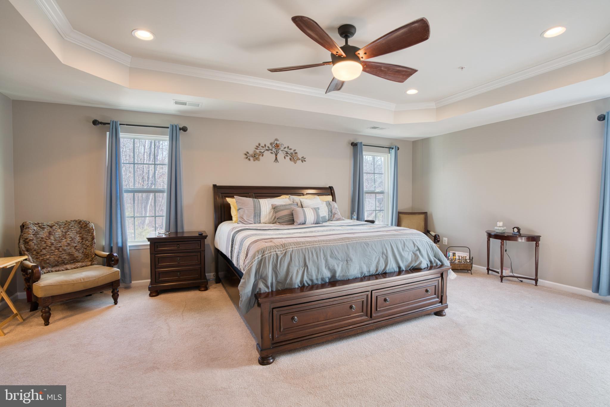 505 Potomac Road Joppa, MD 21085 - Photo 58 of 66 a spacious bedroom with a bed and a couch