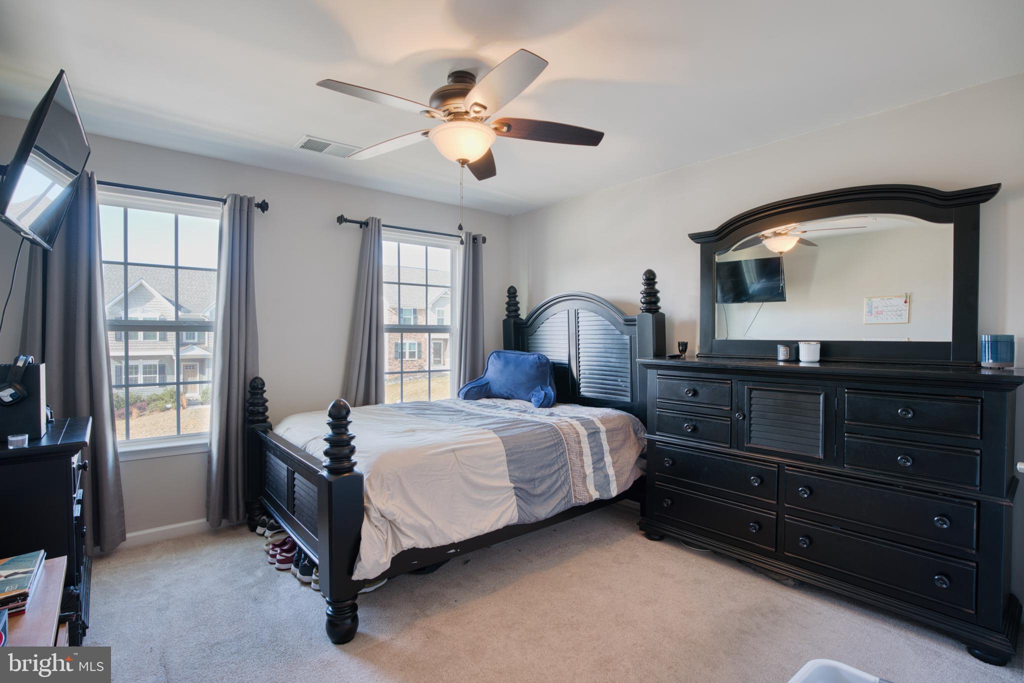 505 Potomac Road Joppa, MD 21085 - Photo 64 of 66 a bedroom with a bed and a dresser