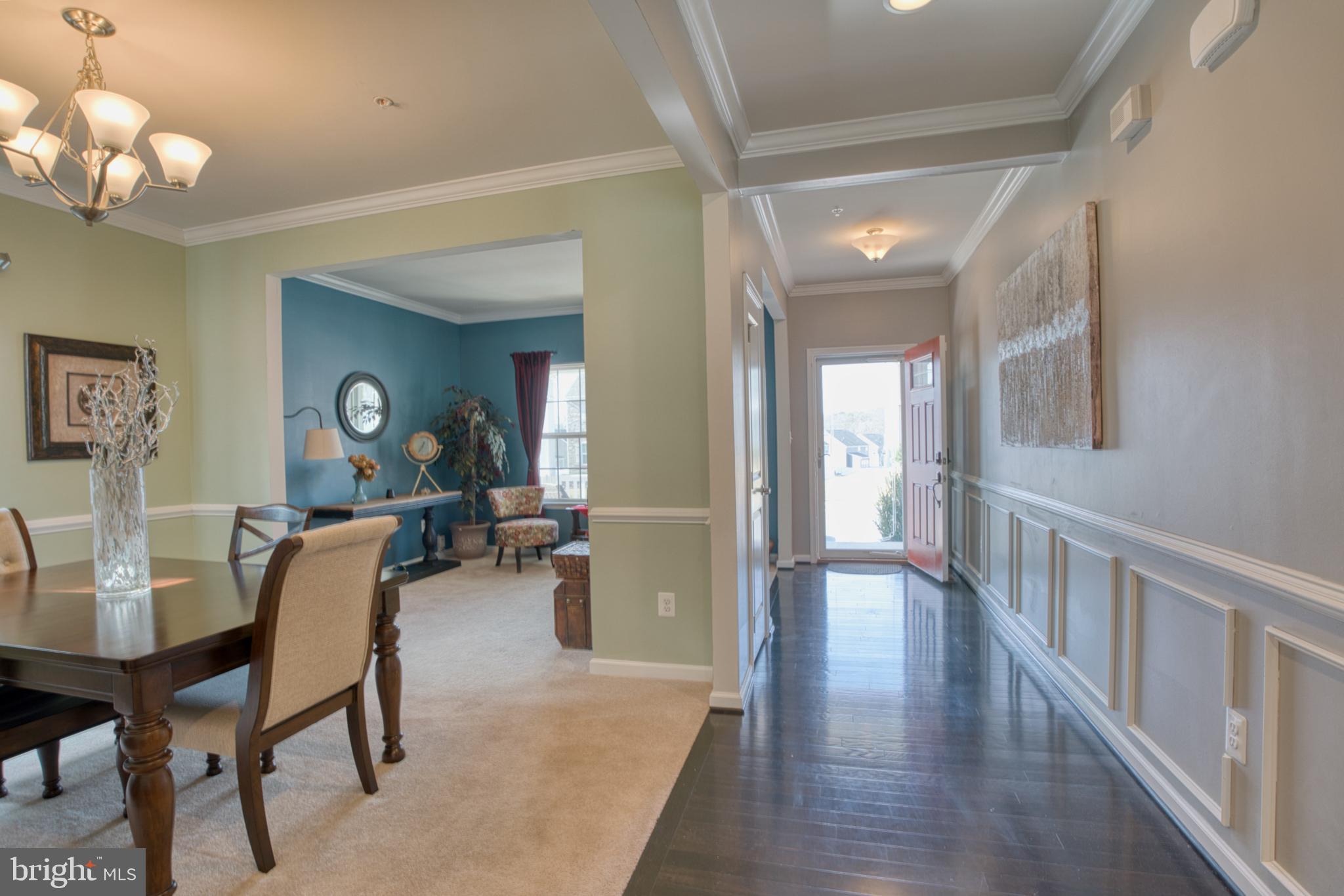 505 Potomac Road Joppa, MD 21085 - Photo 10 of 66 a view of a livingroom with furniture wooden floor and a chandelier