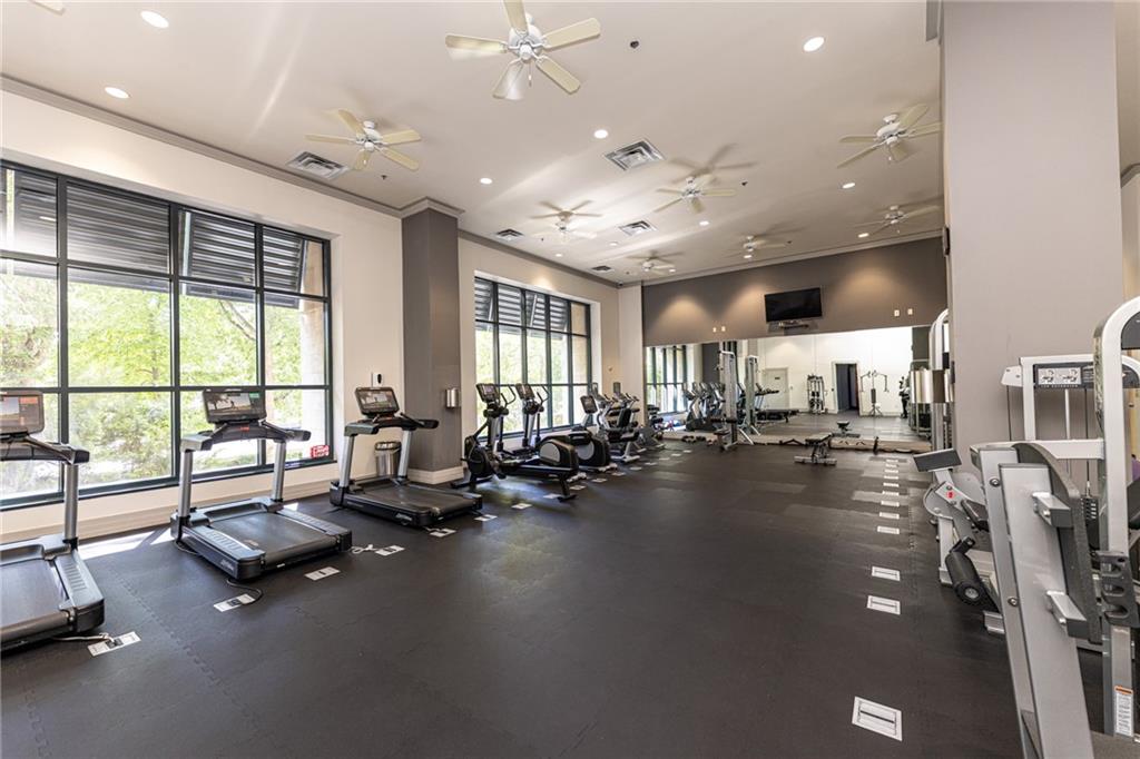 3040 Peachtree Road Northwest, Unit 613 Atlanta, GA 30305 - Photo 21 of 30 a view of a room with gym equipment