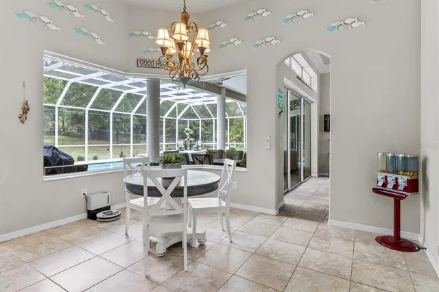a living room with furniture fireplace and flat screen tv
