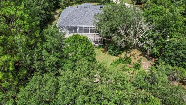 a view of house with outdoor space and garden