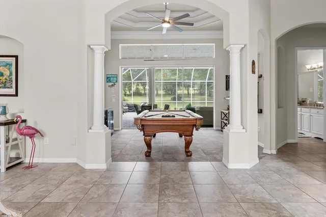 a living room with furniture and window
