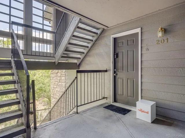 a view of a house with a street