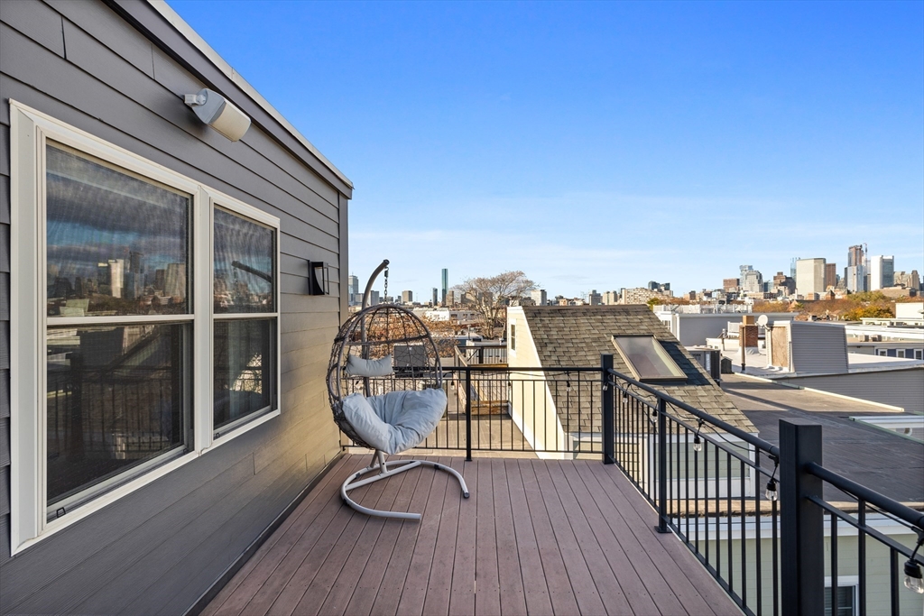 112 West 9th Street, Unit PH4 Boston, MA 02127 - Photo 25 of 34 a view of a balcony with chairs