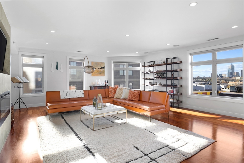 112 West 9th Street, Unit PH4 Boston, MA 02127 - Photo 7 of 34 a living room with furniture and a large window