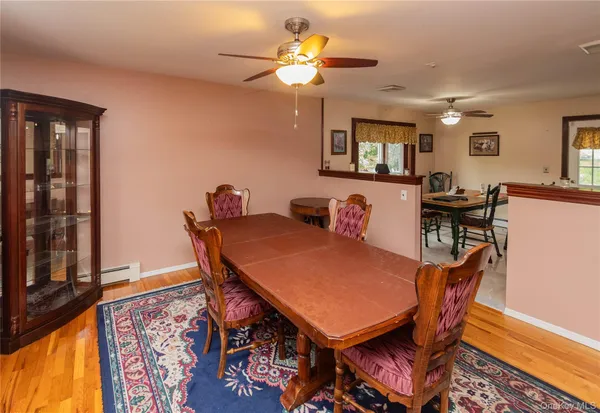 a kitchen with stainless steel appliances granite countertop a sink refrigerator and cabinets