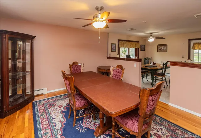 a kitchen with stainless steel appliances granite countertop a sink refrigerator and cabinets