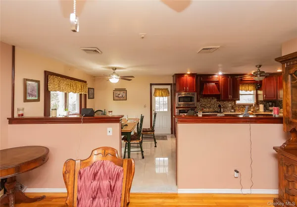 a bed room with a bed and a chandelier