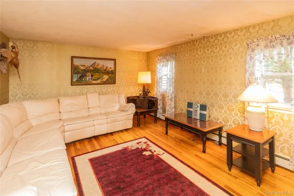 a living room with furniture pool and a table
